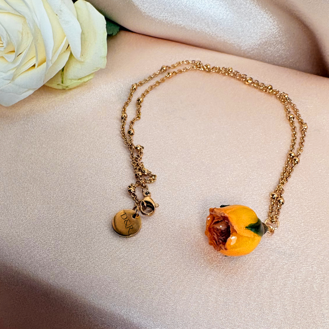Enjoy our hand-finished preserved resin rose yellow necklace with a 18k gold plated chain, based in the UK and female owned.